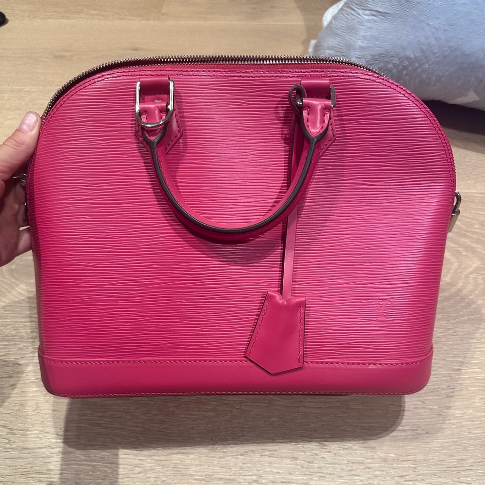 Louis Vuitton Alma handbag Epi leather